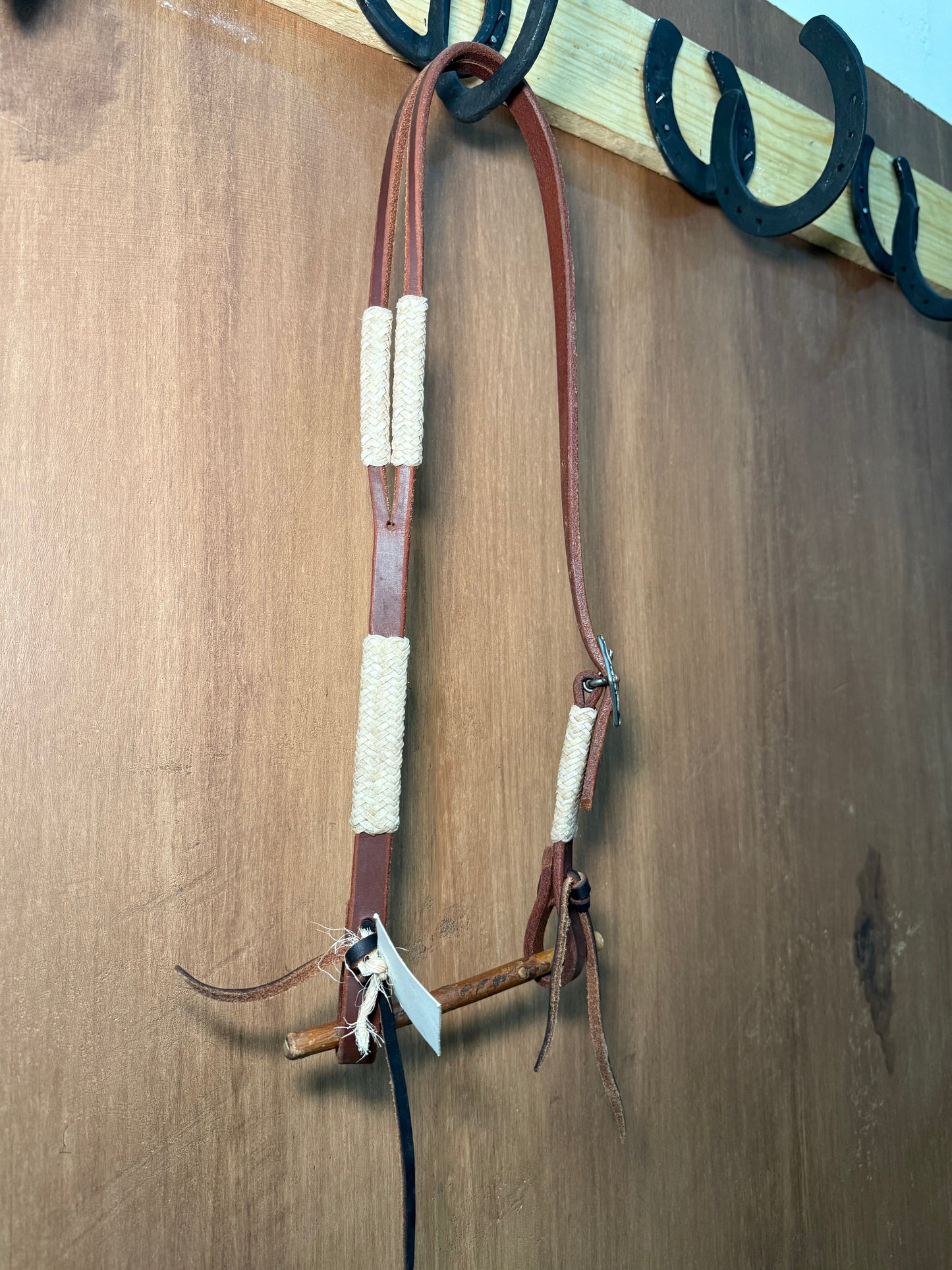 Split ear 5/8” with rawhide accents
