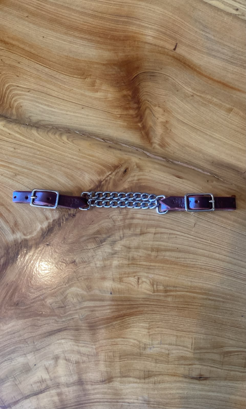 Double chain curb strap