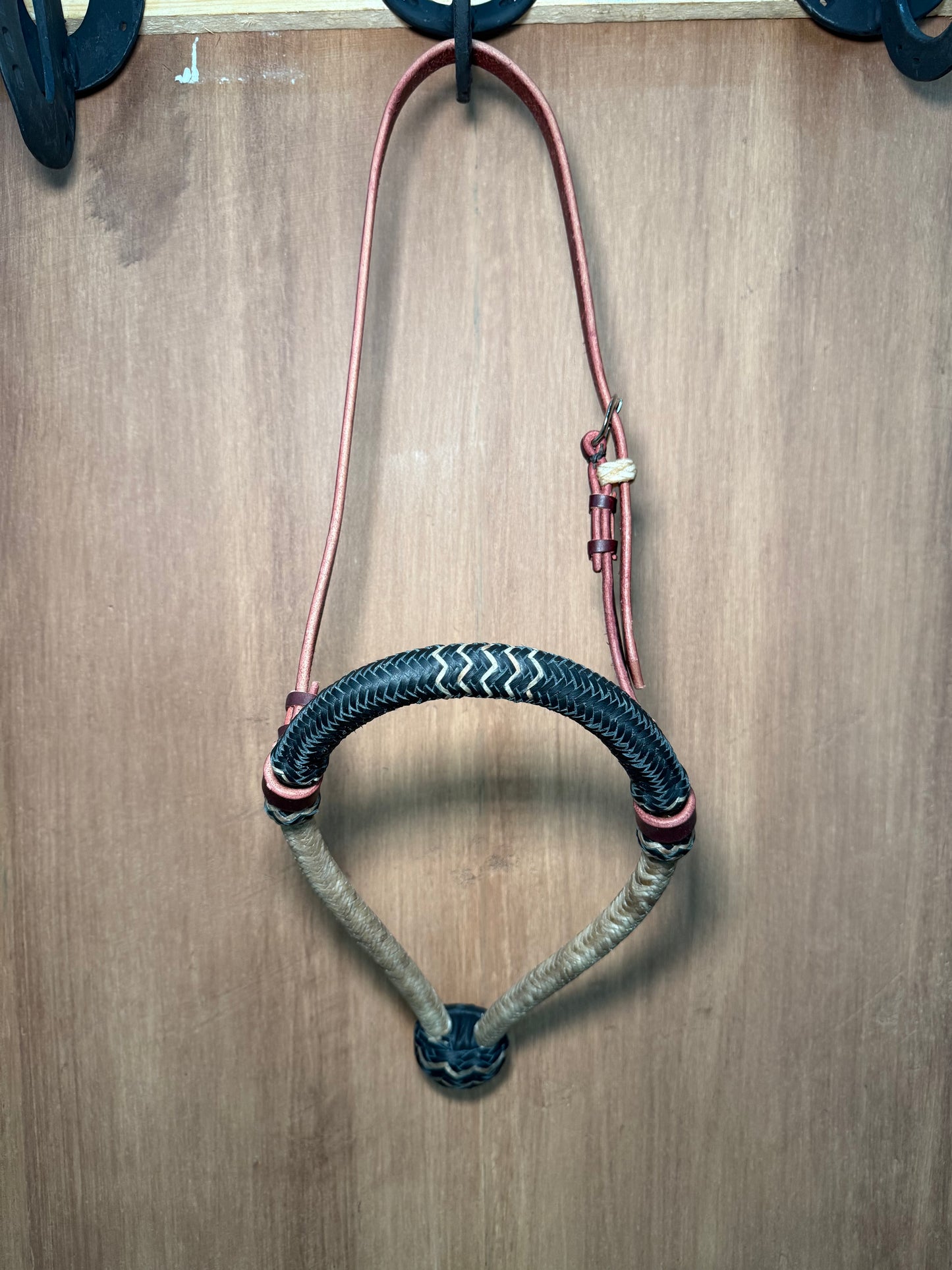 Black rawhide braided bosal 5/8” with natural accents and leather headstall