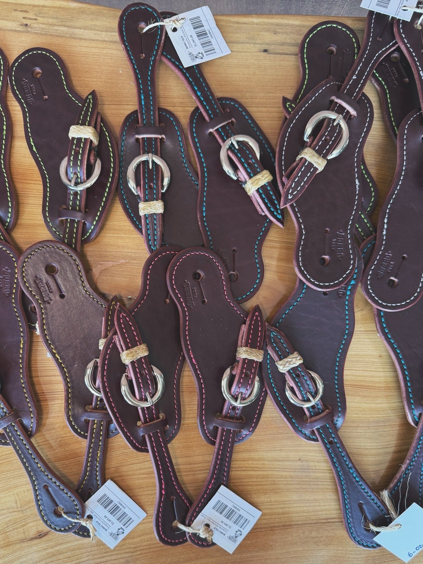 Colored stitched spurs straps