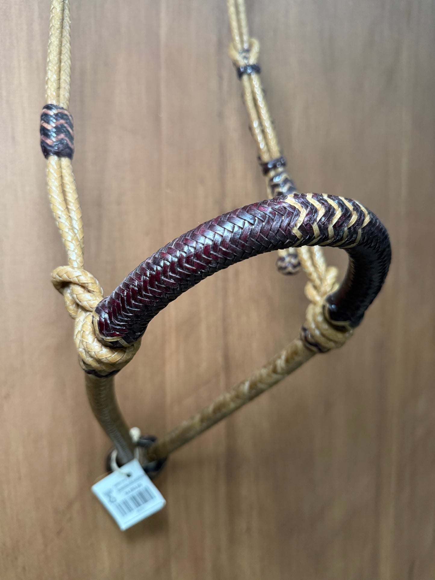 5/8” rawhide braided bosal with natural accents & matching rawhide hanger with black knots