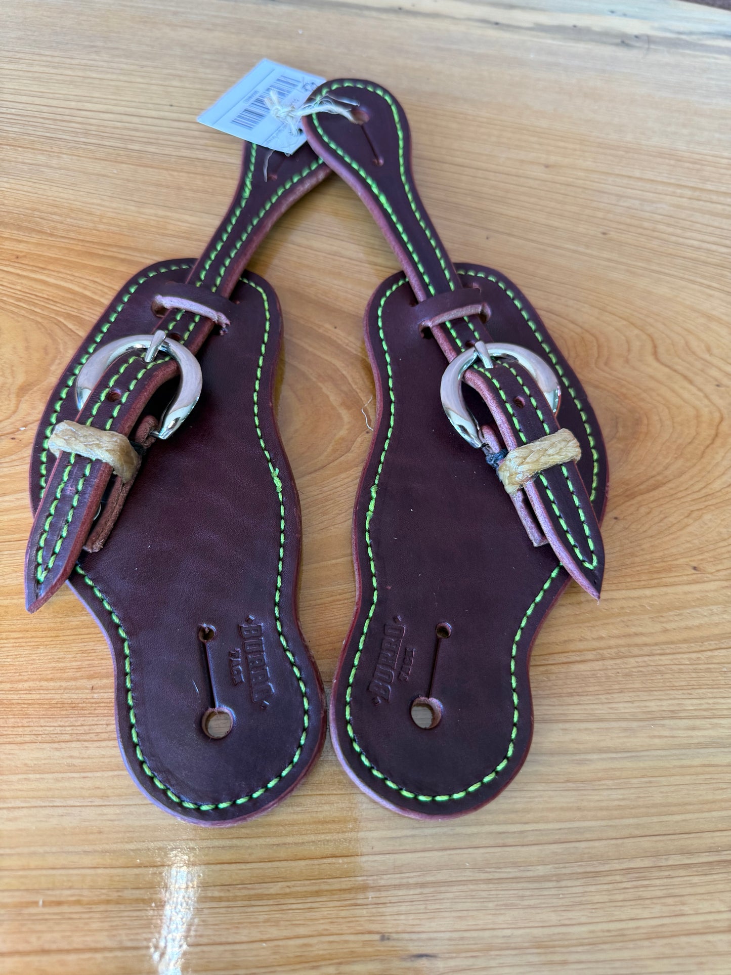 Colored stitched spurs straps