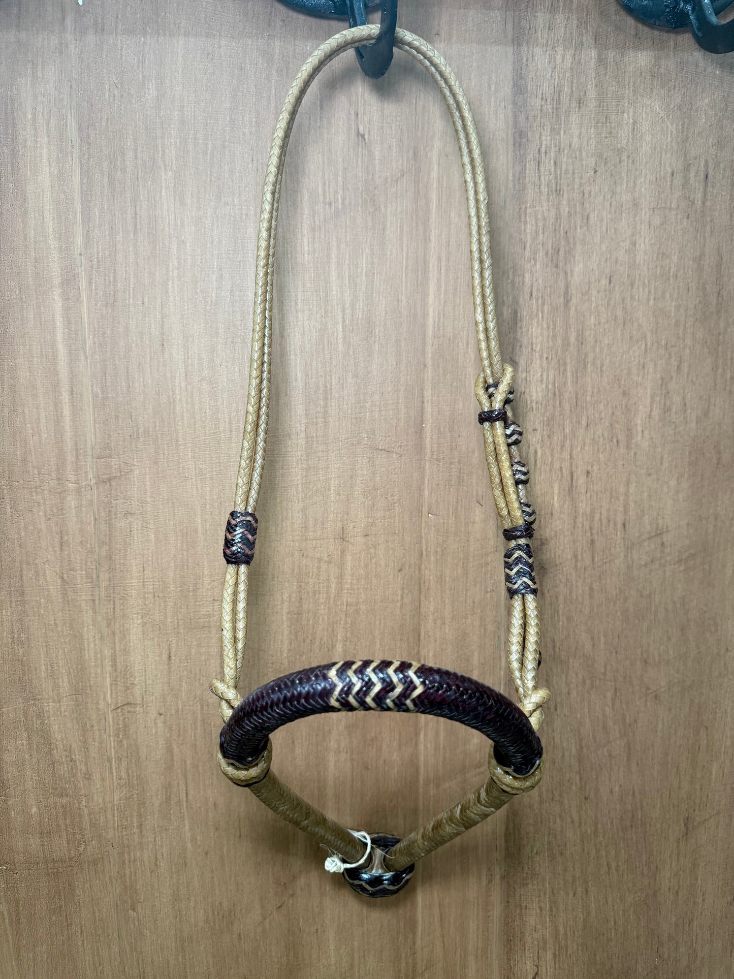 5/8” rawhide braided bosal with natural accents & matching rawhide hanger with black knots