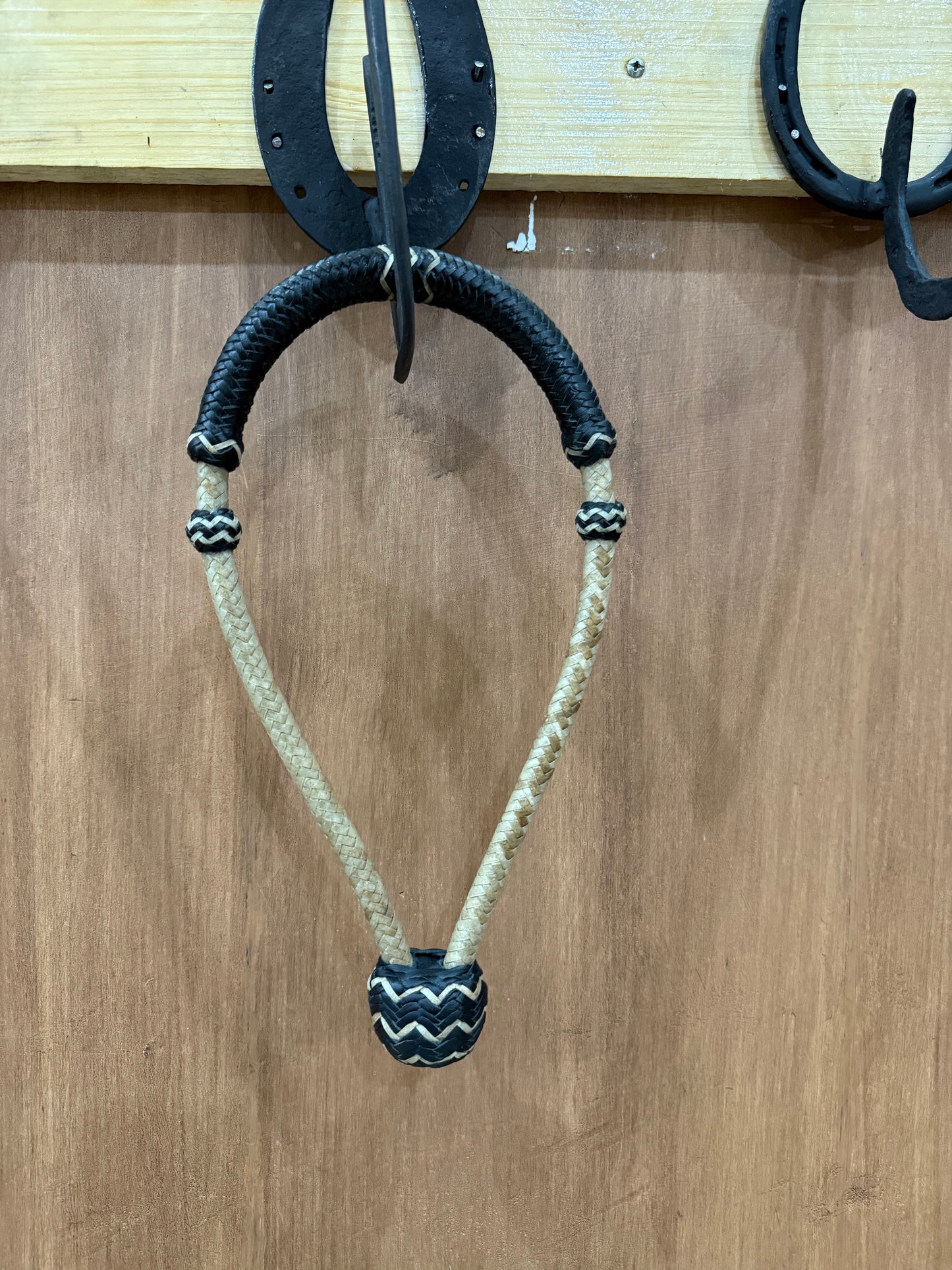Black rawhide braided bosal 1/2” with natural accents
