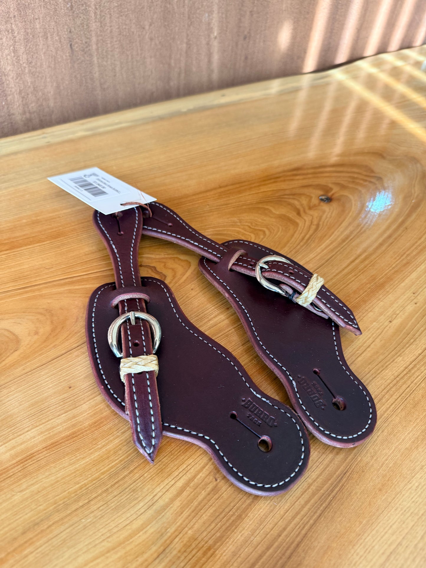 Colored stitched spurs straps