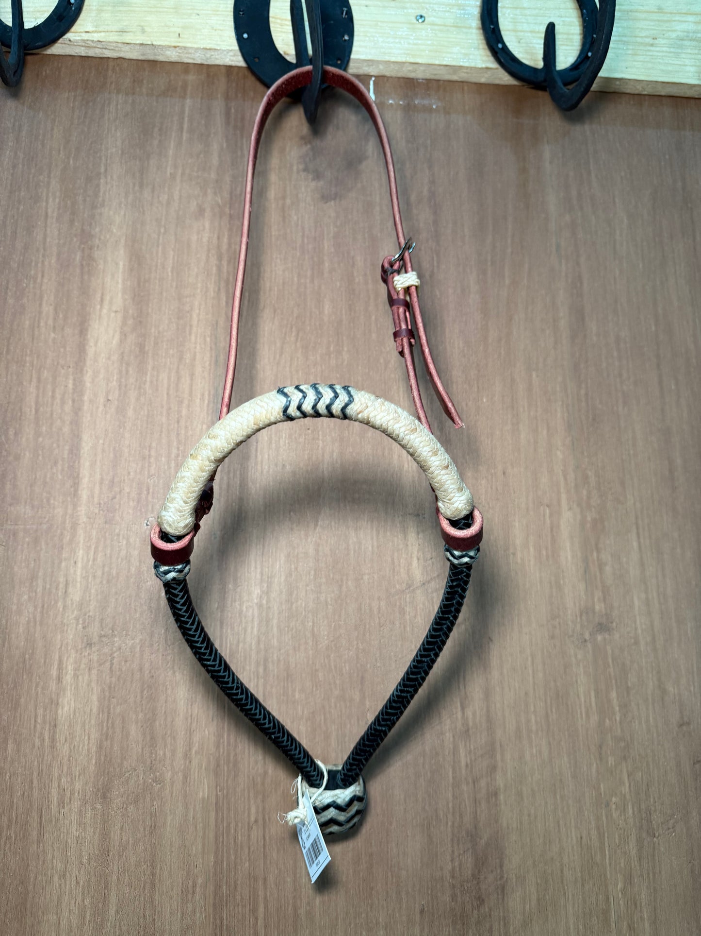 Two-tone rawhide bosal 1/2” with black accents and leather headstall