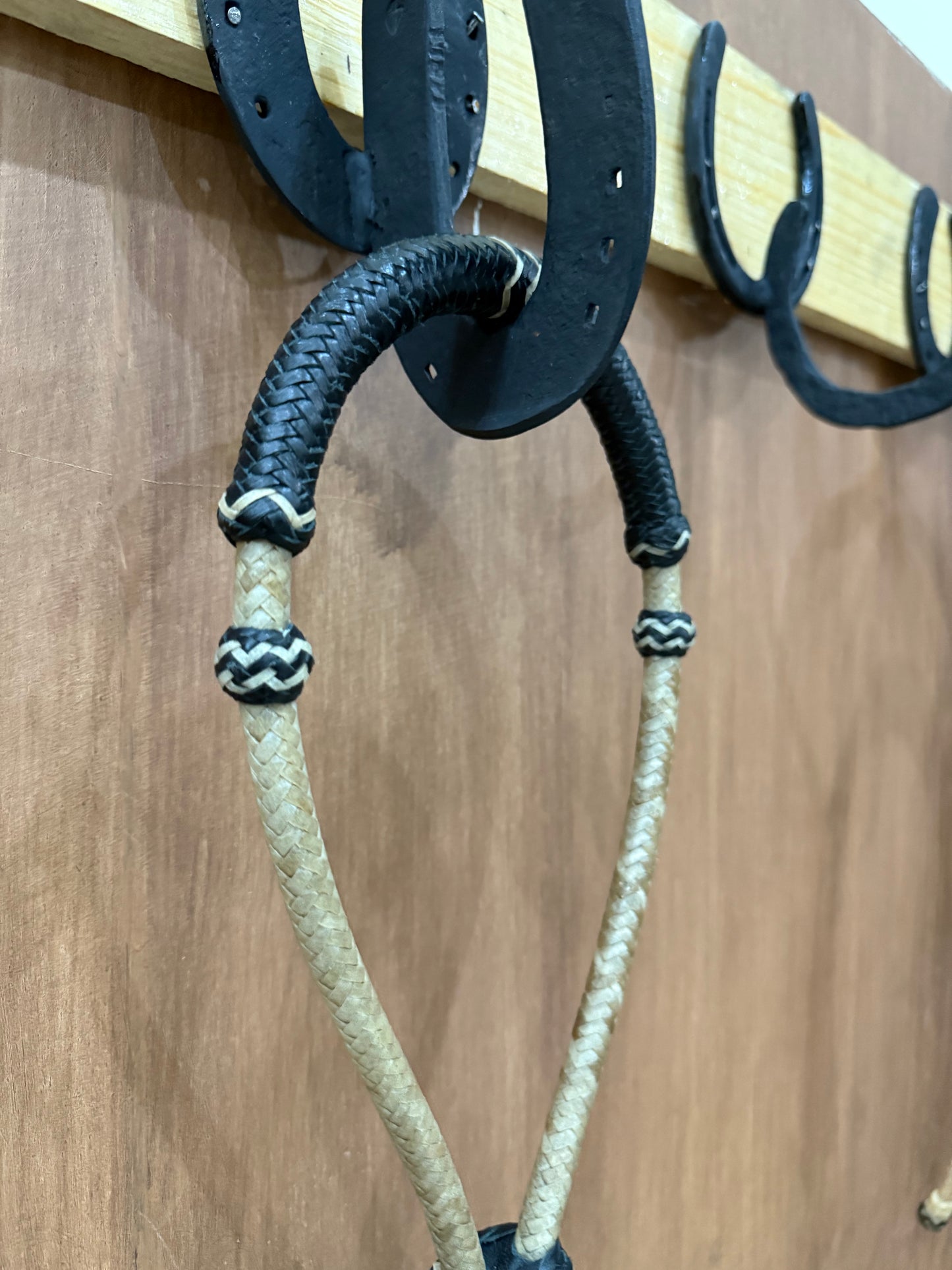 Black rawhide braided bosal 1/2” with natural accents