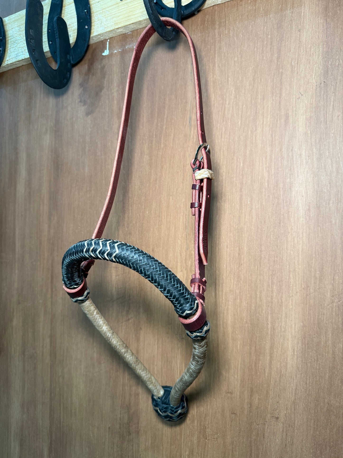 Black rawhide braided bosal 5/8” with natural accents and leather headstall