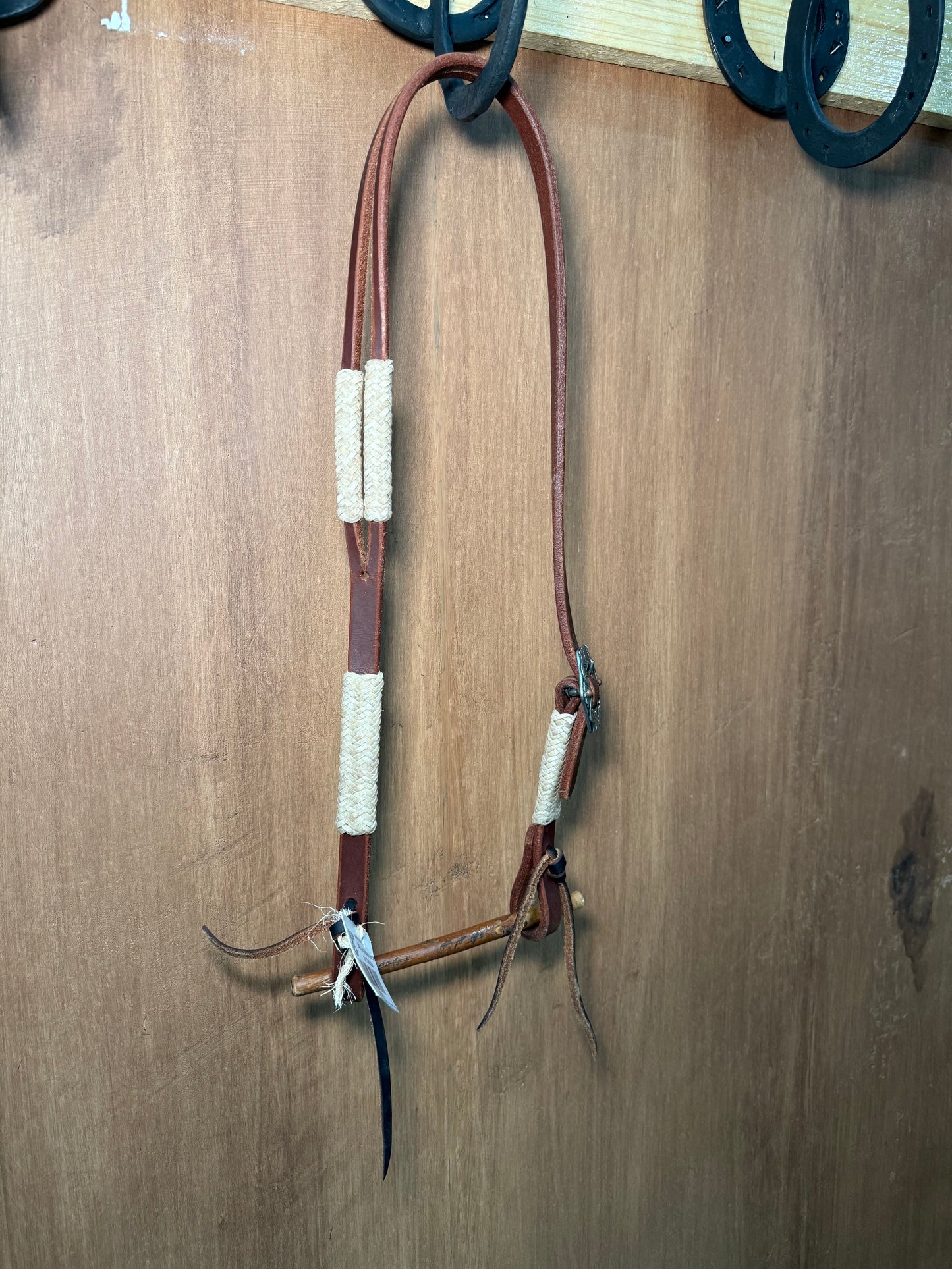 Split ear 5/8” with rawhide accents