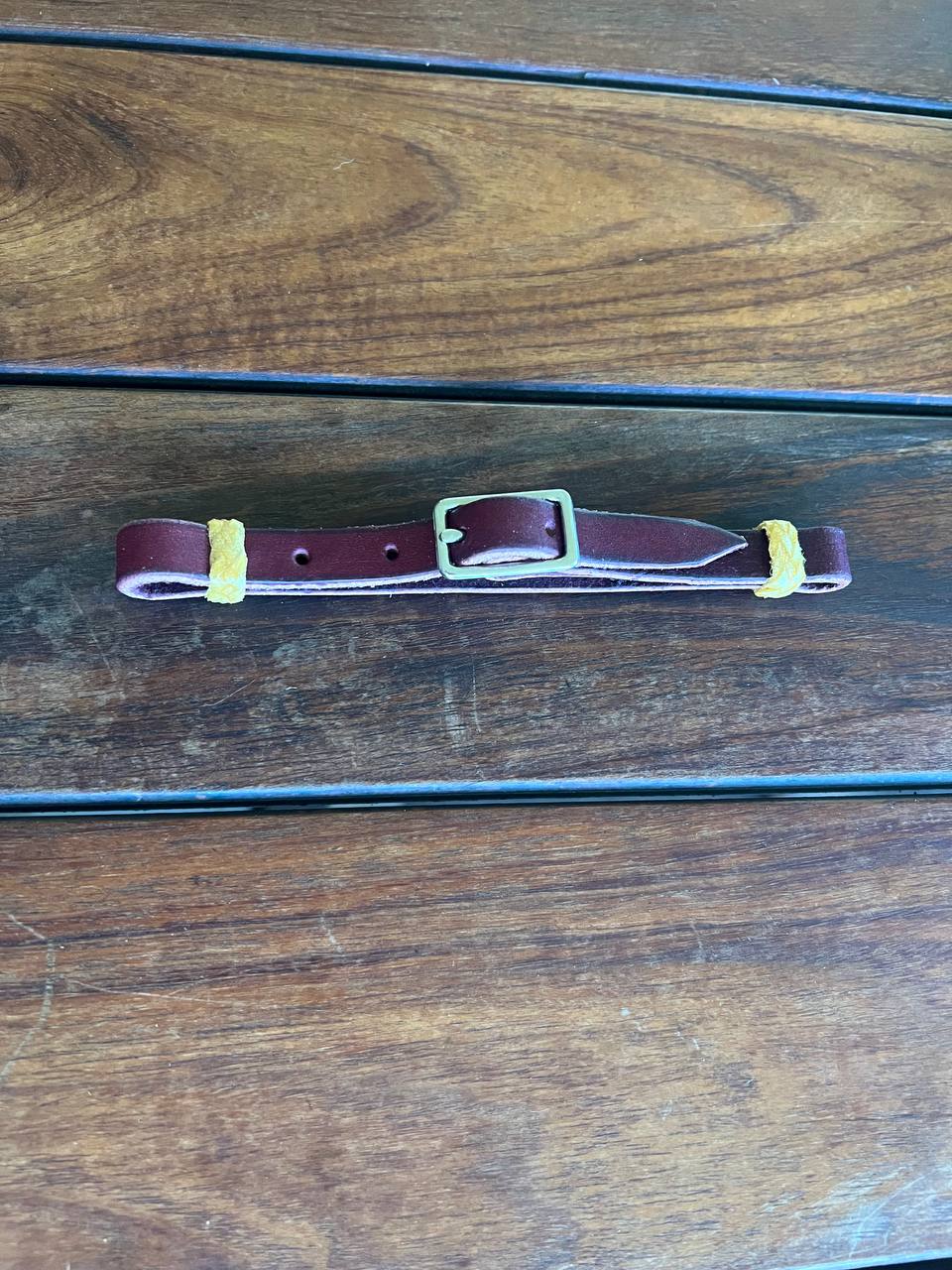 Curb One buckle rawhide accents