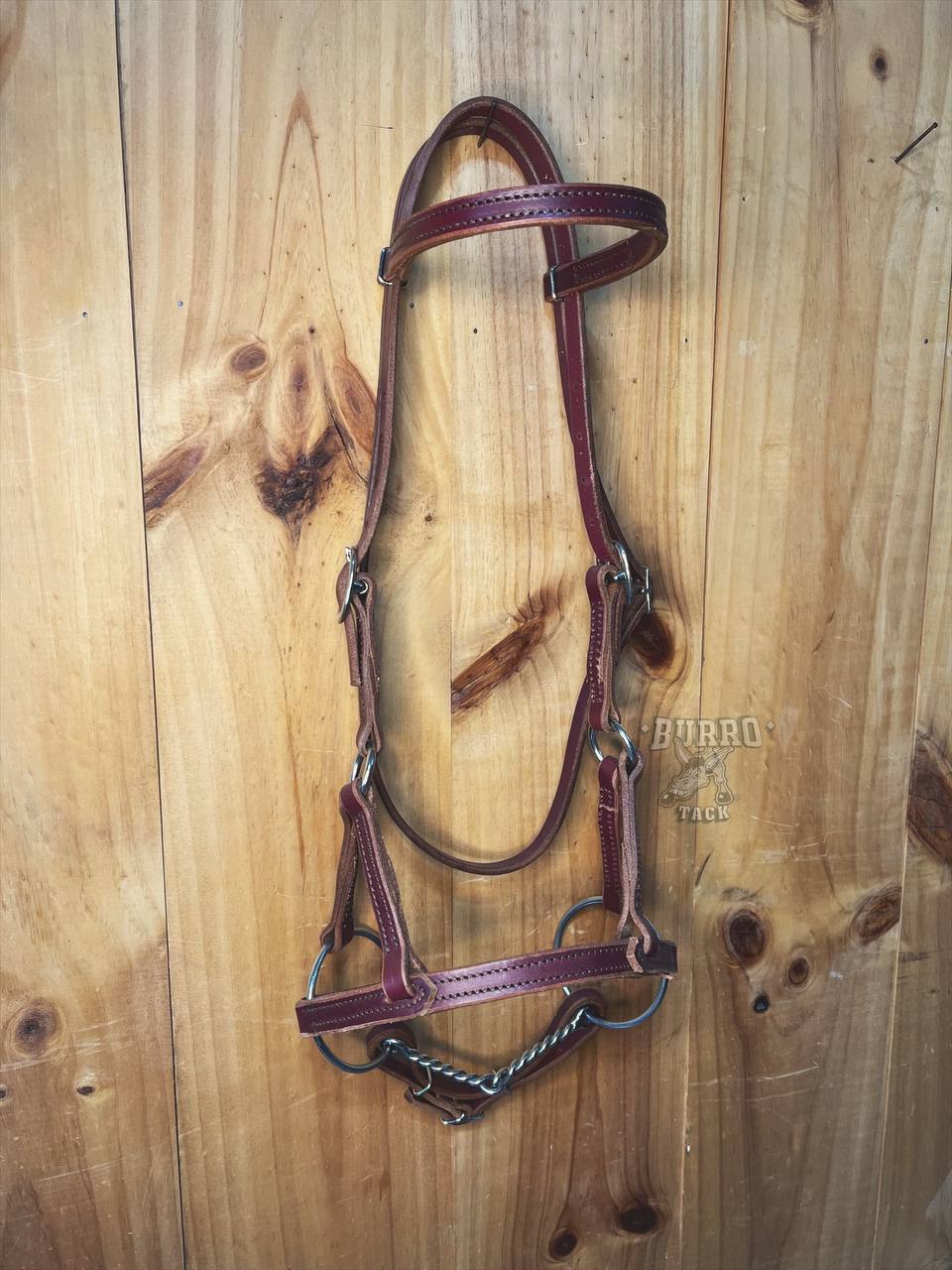 Side pull with snaffle bit twisted