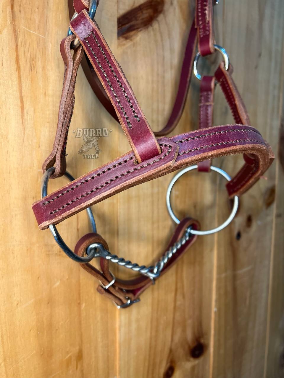 Side pull with snaffle bit twisted